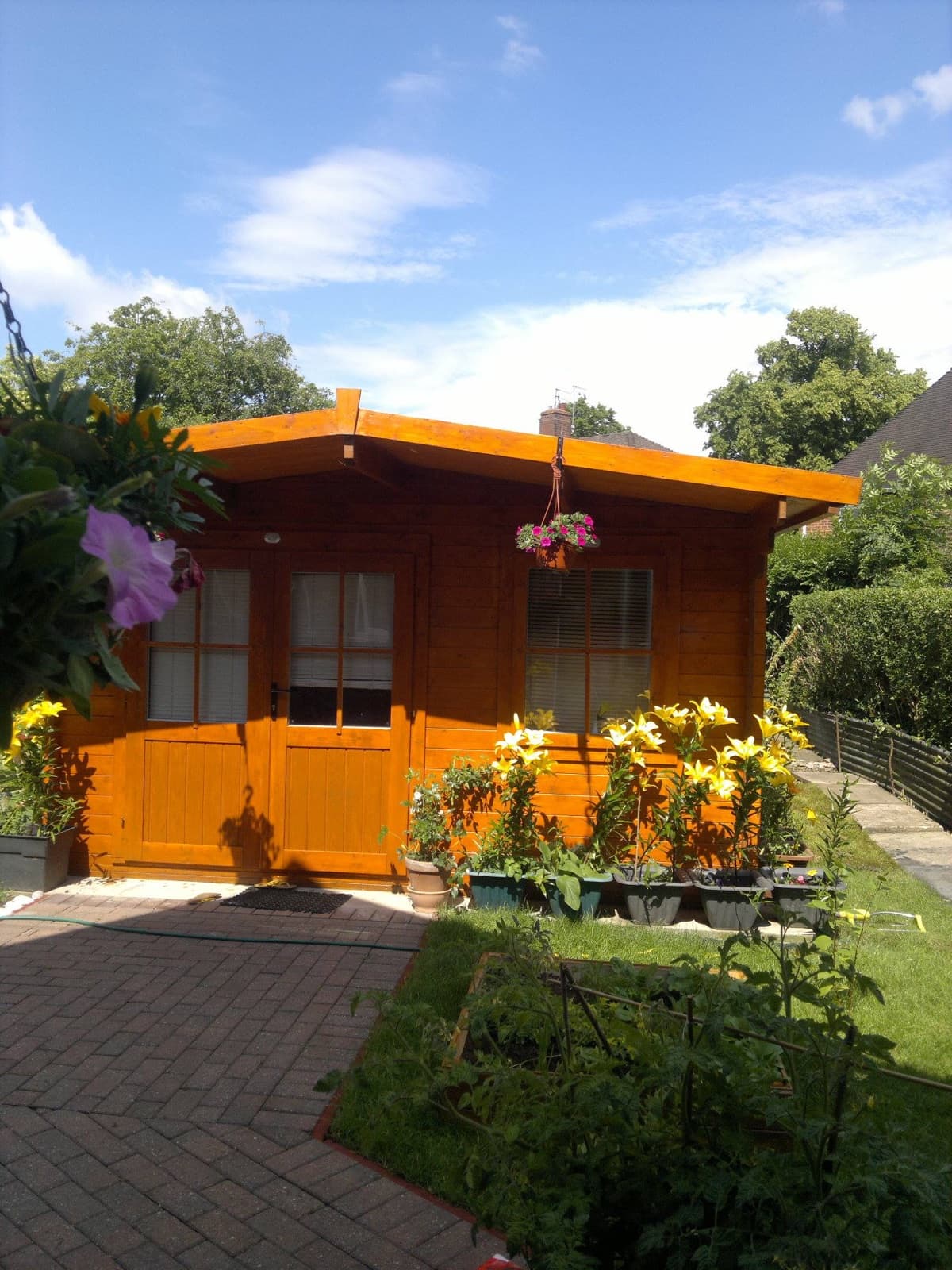 The log cabin massage studio in the garden at 8 Withies Road, Stoke-on-Trent
